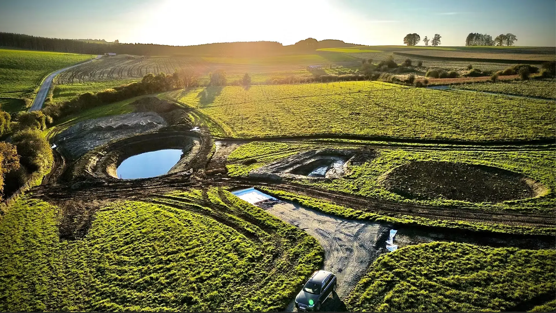 Aménagement de terrain et chemin agricole avec gestion des eaux sur propriété rurale